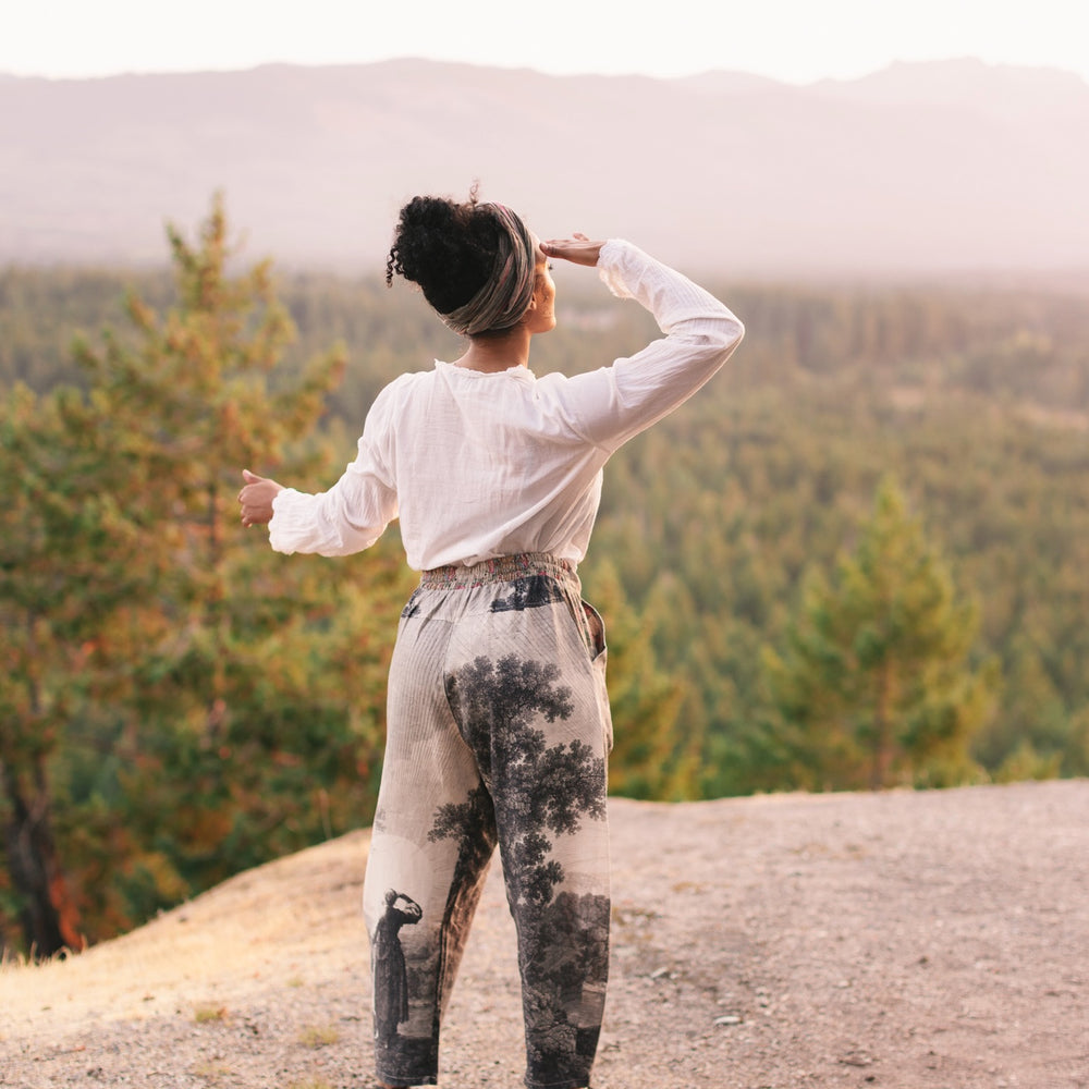 
                  
                    Linen Still I Rise Artist Pants with lantern hem, featuring antique landscape etchings in a rich, layered print celebrating resilience – Market of Stars
                  
                