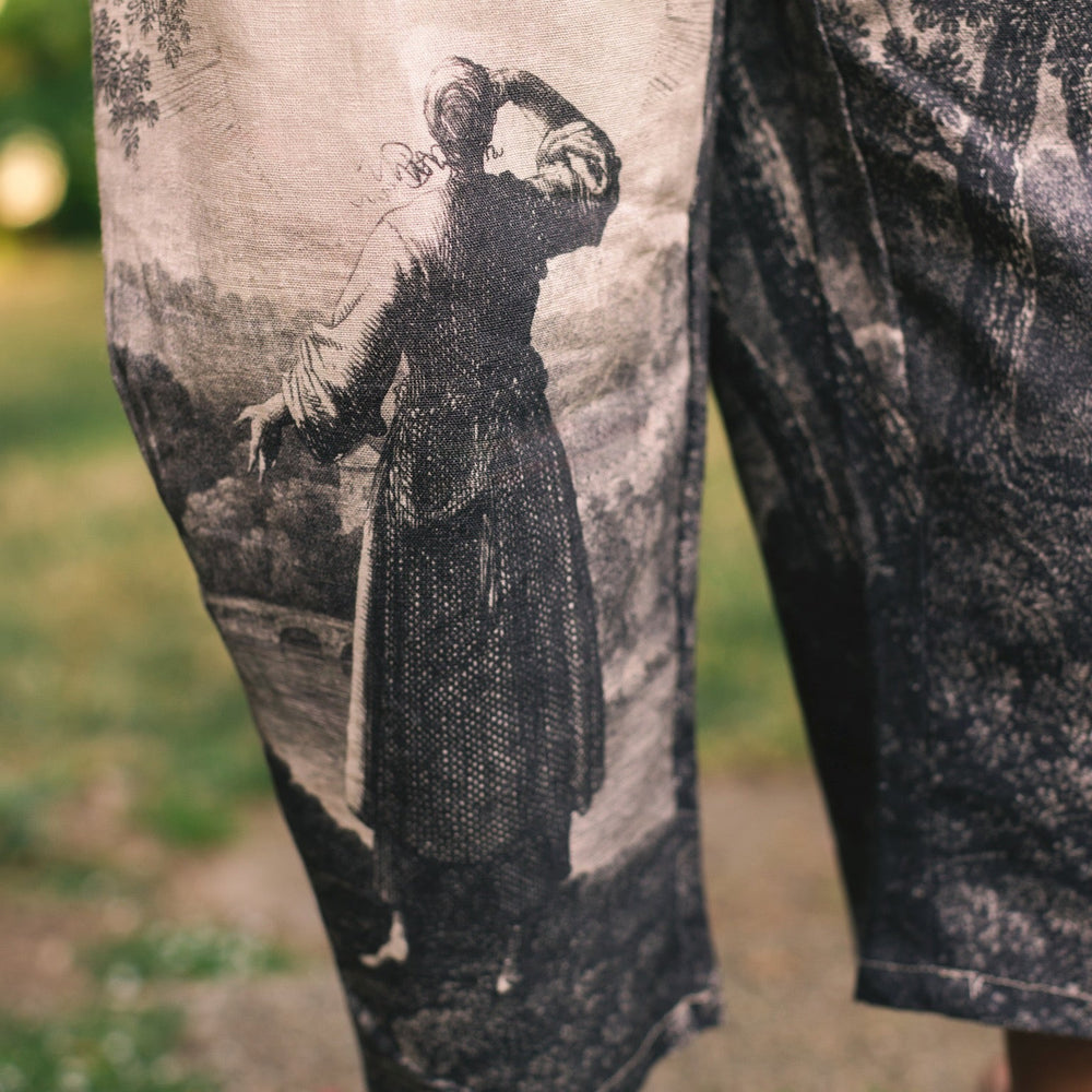 
                  
                    Linen Still I Rise Artist Pants with lantern hem, featuring antique landscape etchings in a rich, layered print celebrating resilience – Market of Stars
                  
                
