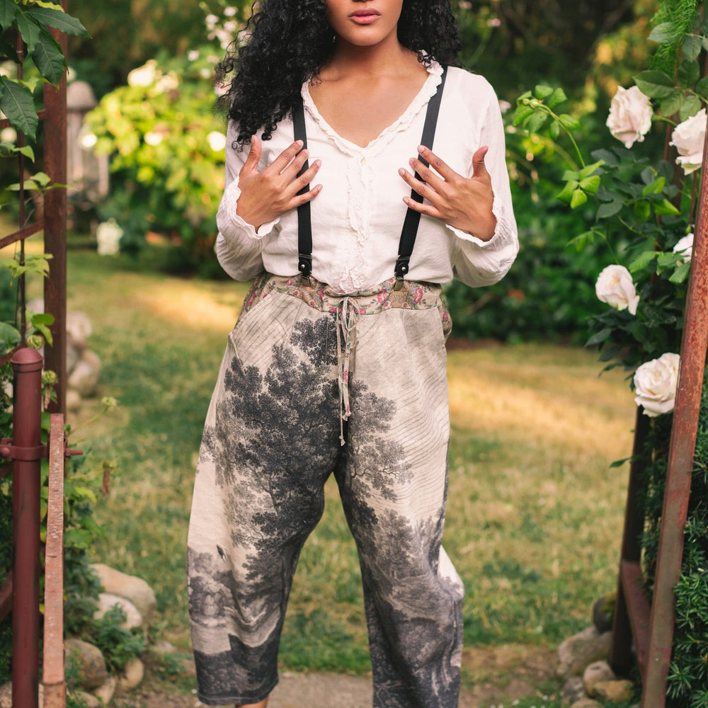 
                  
                    Linen Still I Rise Artist Pants with lantern hem, featuring antique landscape etchings in a rich, layered print celebrating resilience – Market of Stars
                  
                