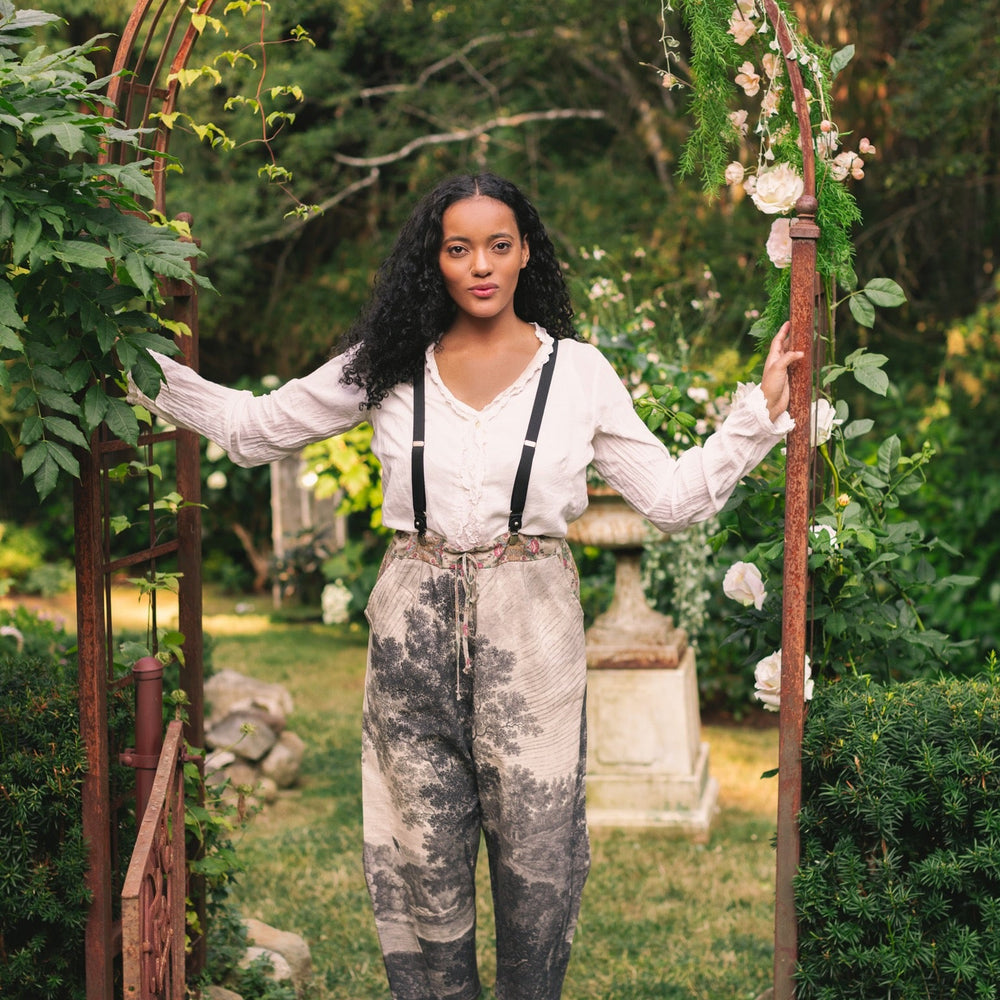 
                  
                    Linen Still I Rise Artist Pants with lantern hem, featuring antique landscape etchings in a rich, layered print celebrating resilience – Market of Stars
                  
                