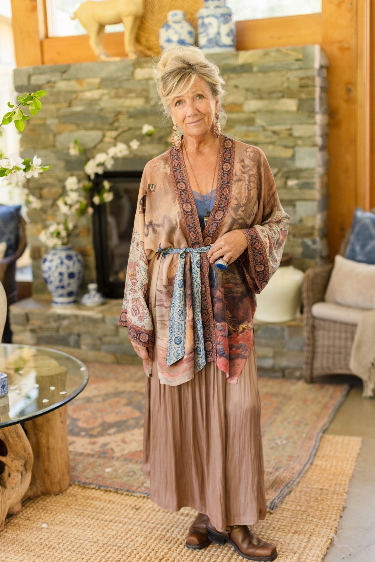 Model(s) wearing The Storyteller -- a mid-length Matinée kimono duster featuring antique artwork and vintage prints from around the world -- Market of Stars