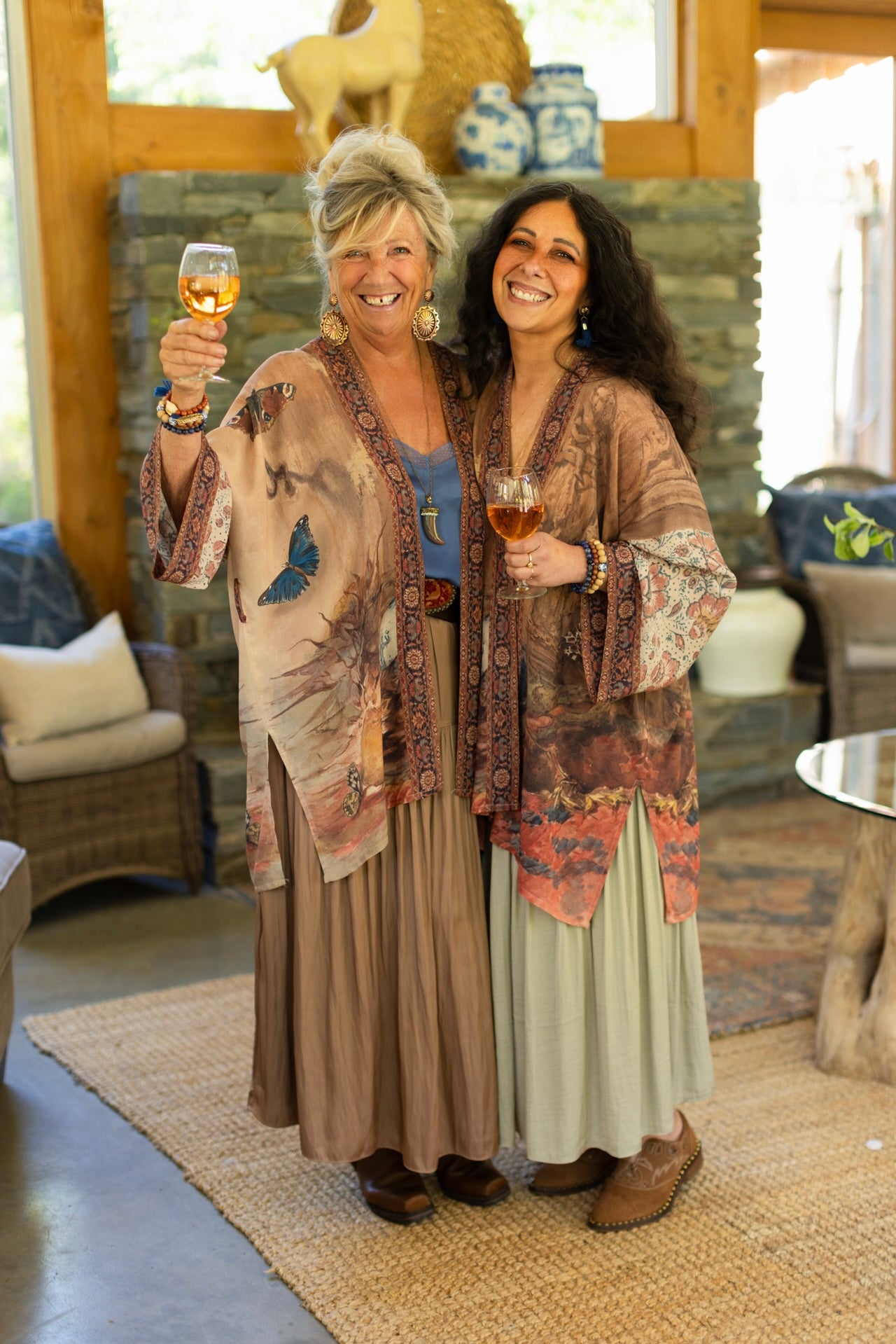 Model(s) wearing The Storyteller -- a mid-length Matinée kimono duster featuring antique artwork and vintage prints from around the world -- Market of Stars