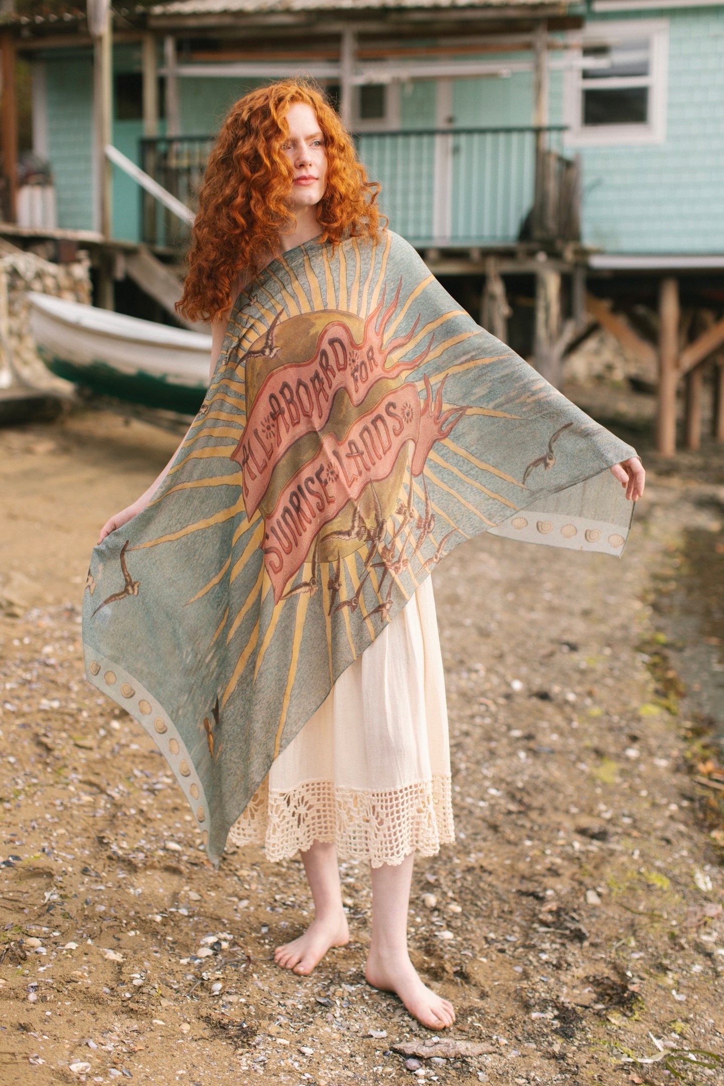 Lightweight scarf featuring a dreamy sunrise landscape and nautical artwork with the words "All aboard for Sunrise Lands" – Market of Stars