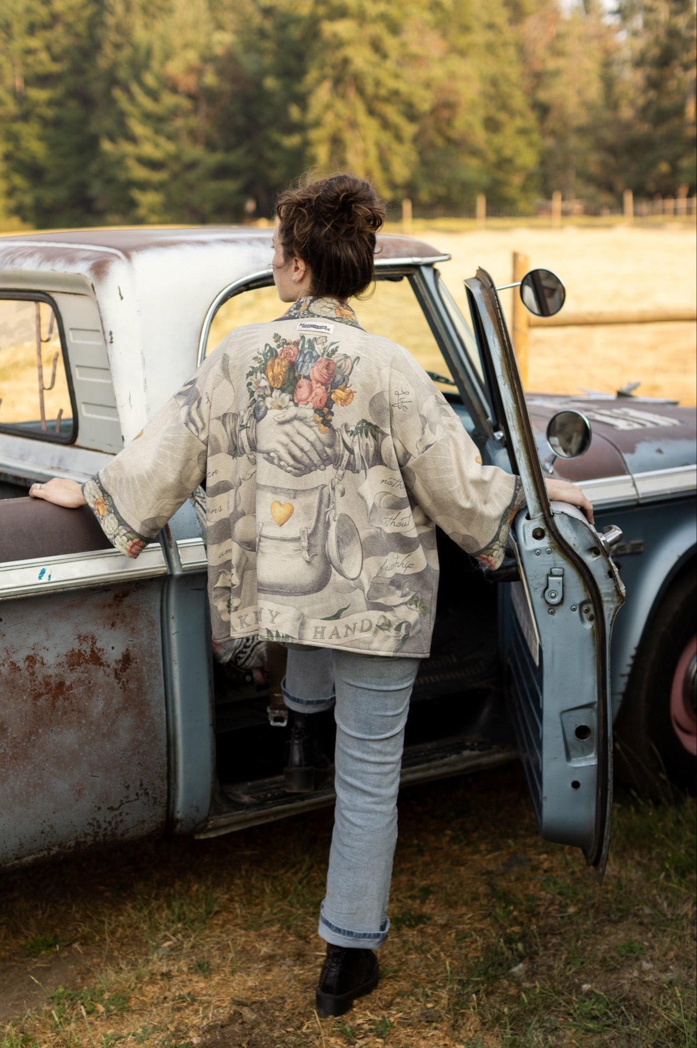 A cozy cardigan lined in fleece featuring Victorian collage artwork and the phrase “Life is nothing without friendship” – Market of Stars