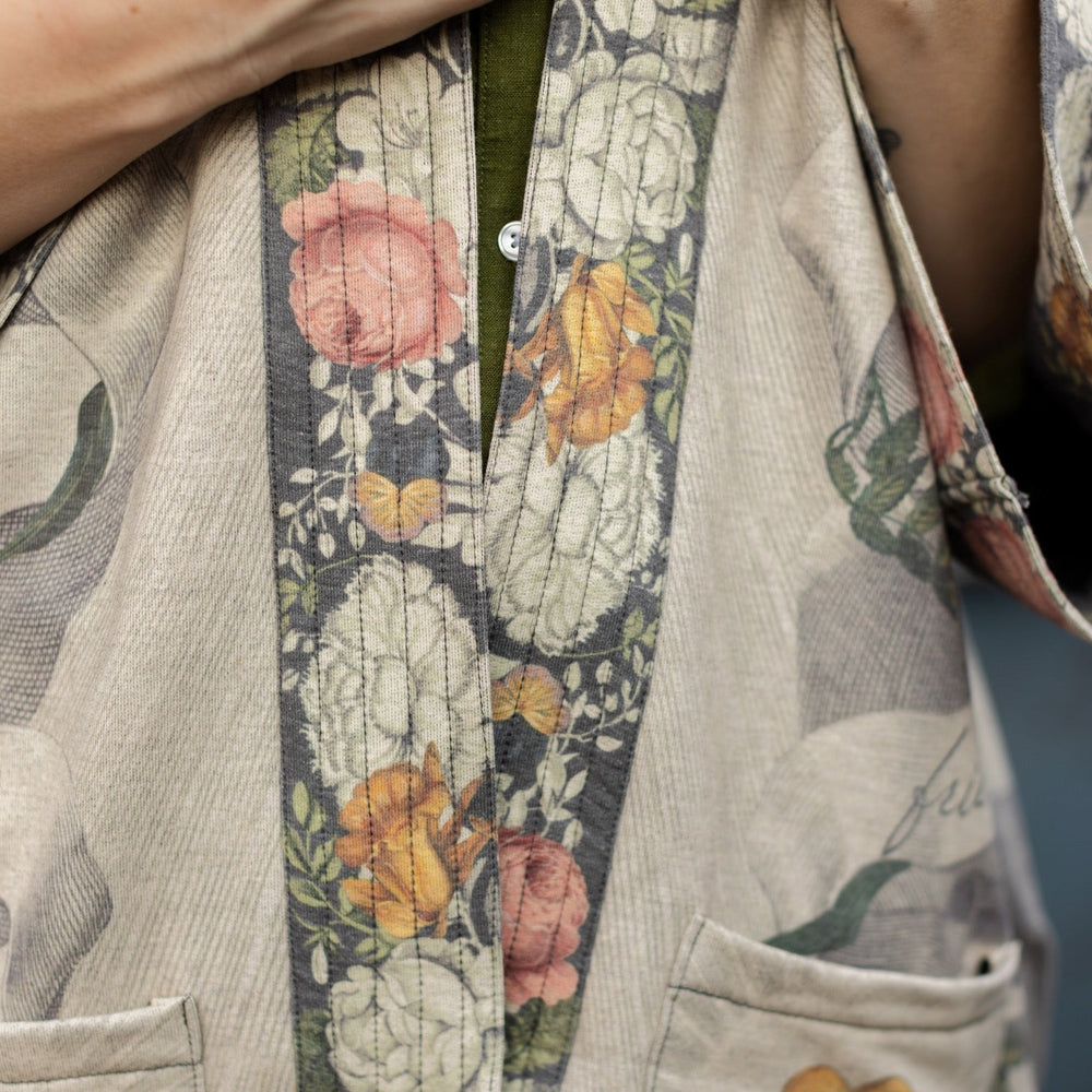 
                  
                    A cozy cardigan lined in fleece featuring Victorian collage artwork and the phrase “Life is nothing without friendship” – Market of Stars
                  
                