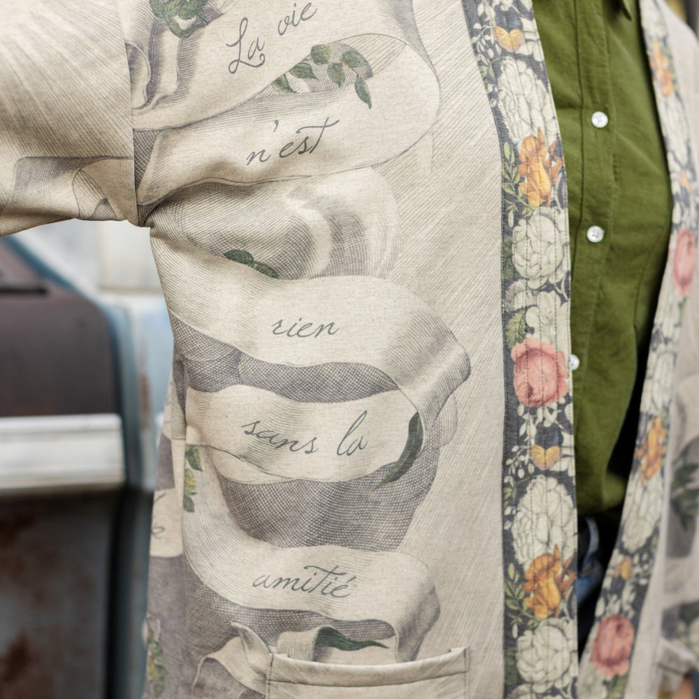 
                  
                    A cozy cardigan lined in fleece featuring Victorian collage artwork and the phrase “Life is nothing without friendship” – Market of Stars
                  
                