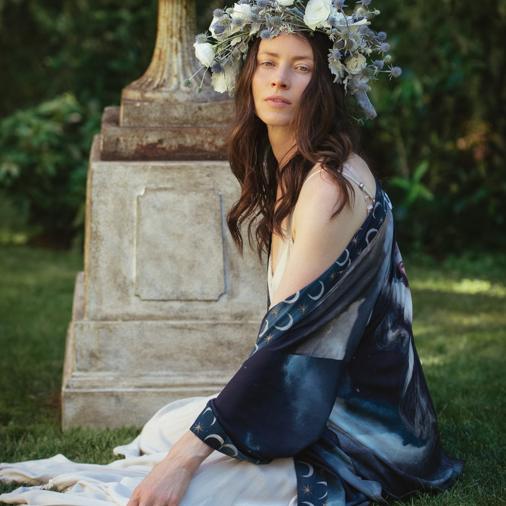 
                  
                    The Dreamer kimono jacket featuring a celestial Moon Goddess portrait with swirling sky detail and starry trim – Market of Stars
                  
                