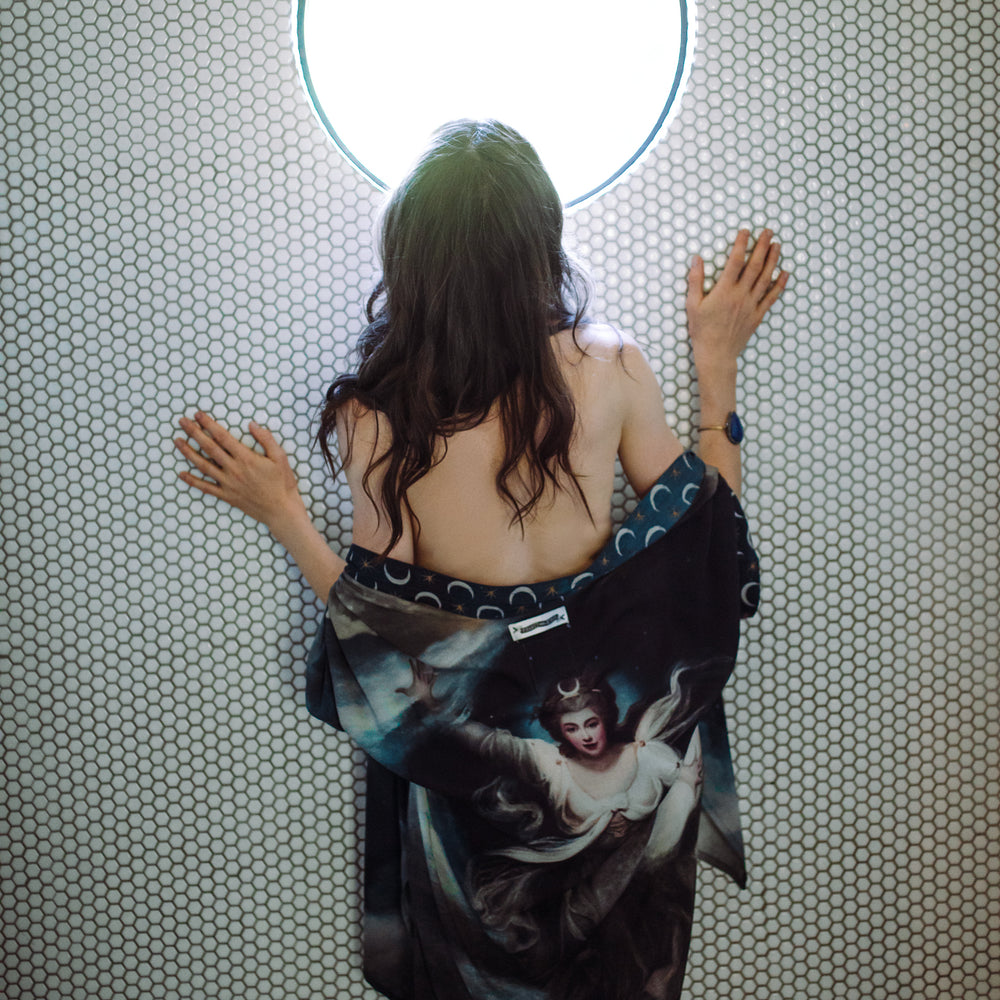 
                  
                    The Dreamer kimono jacket featuring a celestial Moon Goddess portrait with swirling sky detail and starry trim – Market of Stars
                  
                