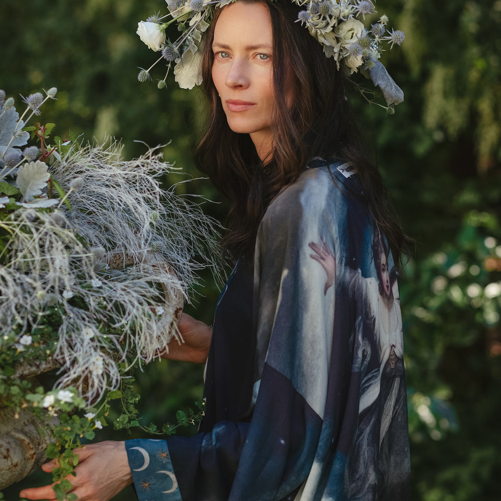 
                  
                    The Dreamer kimono jacket featuring a celestial Moon Goddess portrait with swirling sky detail and starry trim – Market of Stars
                  
                