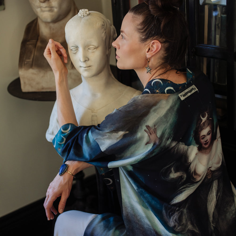 
                  
                    The Dreamer kimono jacket featuring a celestial Moon Goddess portrait with swirling sky detail and starry trim – Market of Stars
                  
                