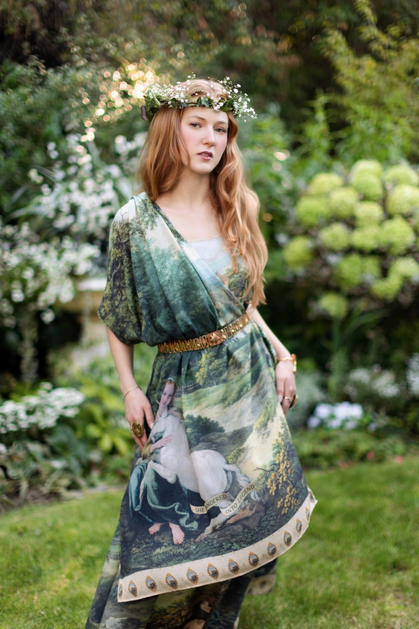 Model wearing a bamboo-viscose scarf ft. vintage artwork & unicorn lorn set against a mossy-green landscape — a romantic piece for the modern dreamer - Market of Stars