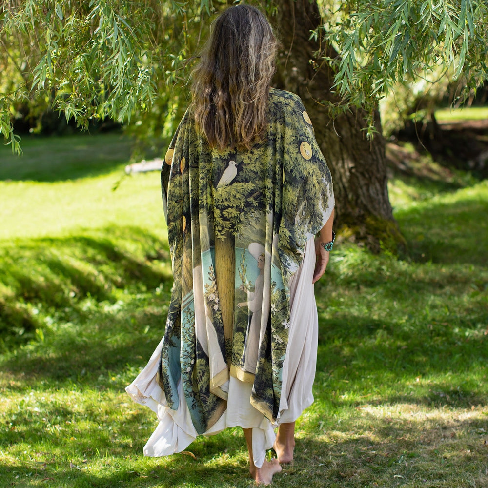 
                  
                    Model wearing Tree of Life Starduster celebrating growth renewal and timeless beauty – Market of Stars
                  
                