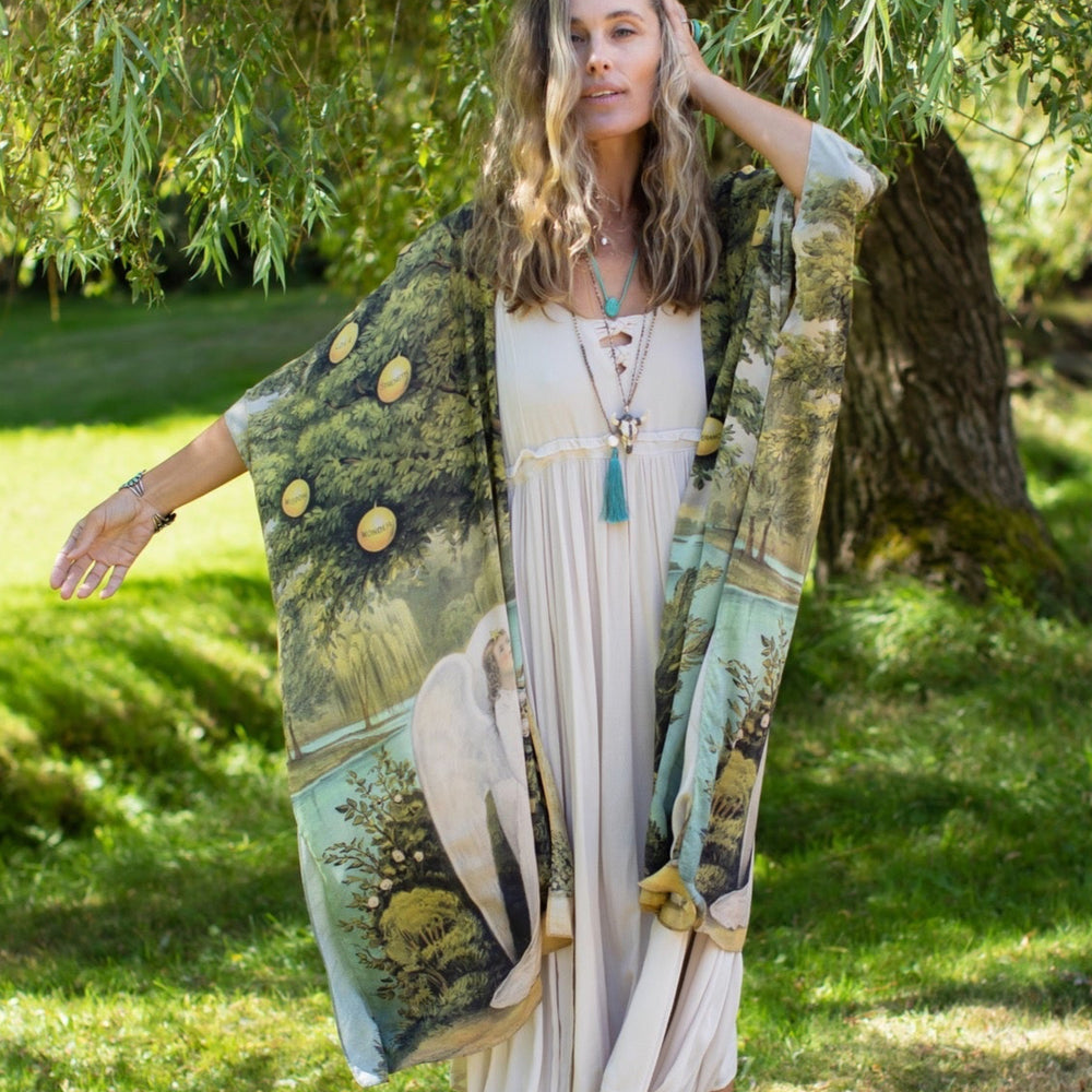 
                  
                    Model wearing Tree of Life Starduster celebrating growth renewal and timeless beauty – Market of Stars
                  
                