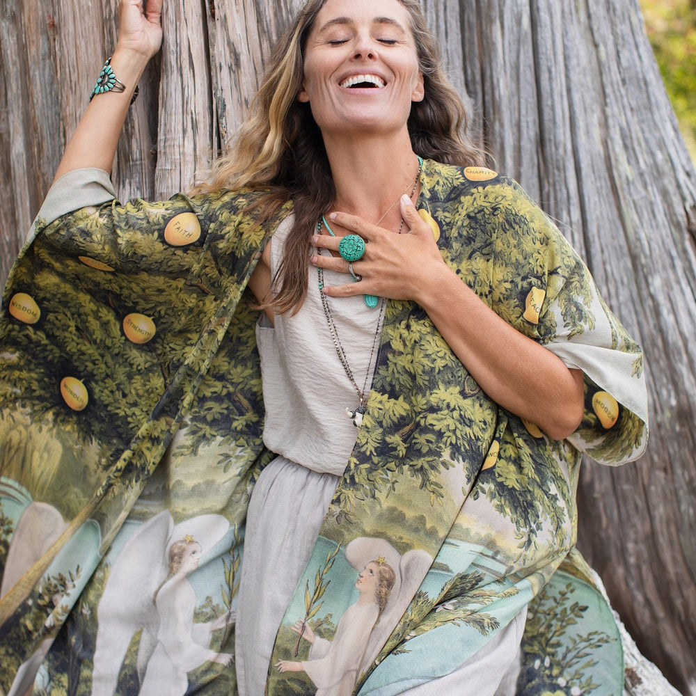 
                  
                    Model wearing Tree of Life Starduster celebrating growth renewal and timeless beauty – Market of Stars
                  
                