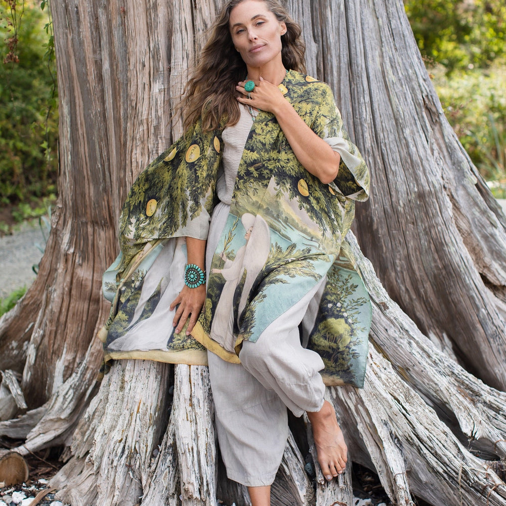 
                  
                    Model wearing Tree of Life Starduster celebrating growth renewal and timeless beauty – Market of Stars
                  
                