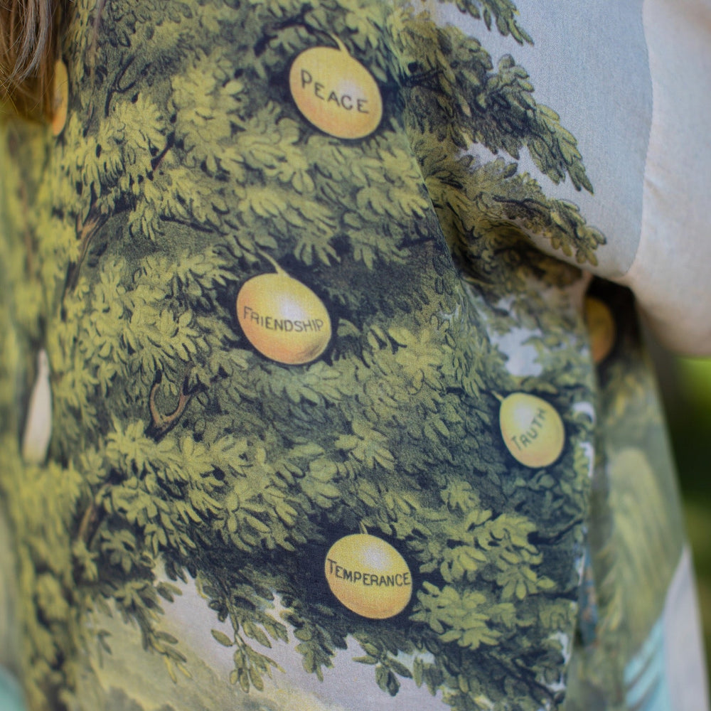 
                  
                    Model wearing Tree of Life Matinée Duster in aquas and verdant greens inspired by antique textiles – Market of Stars
                  
                