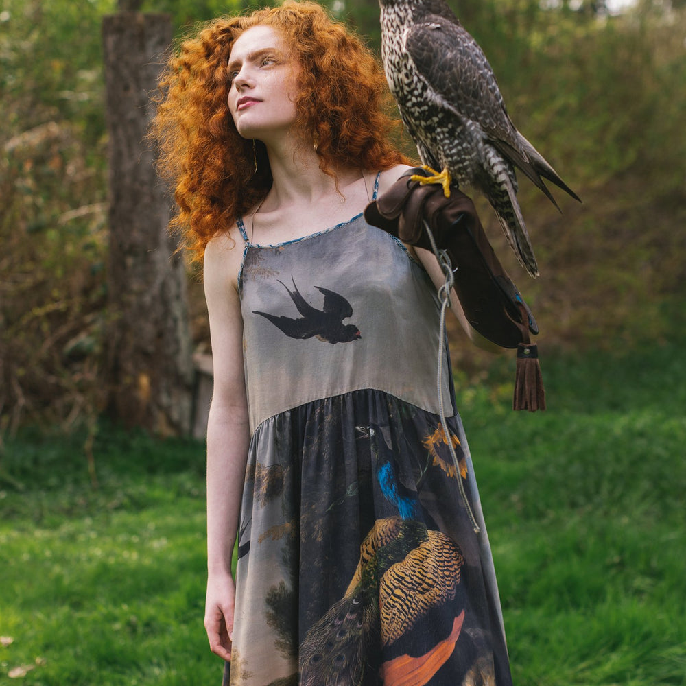 Model wearing Wild Beauty Bohéme Slip Dress featuring peacock birds and antique florals – Market of Stars