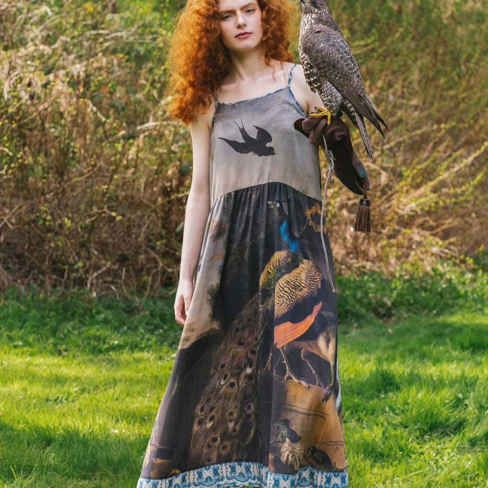 Model wearing Wild Beauty Bohéme Slip Dress featuring peacock birds and antique florals – Market of Stars