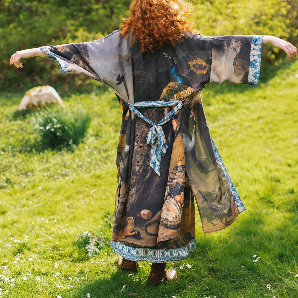 
                  
                    Model wearing Wild Beauty Opera Duster with antique lush florals and peacock – Market of Stars
                  
                