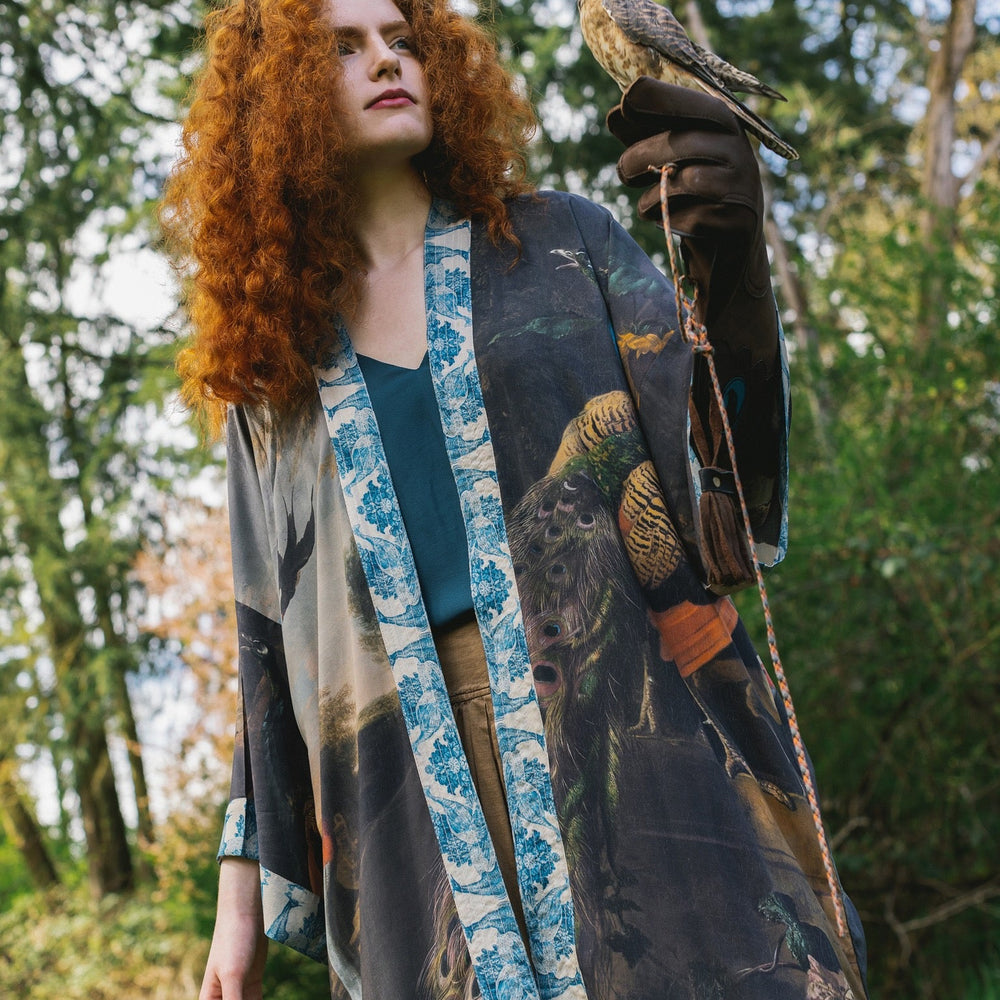 
                  
                    Model wearing Wild Beauty Opera Duster with antique lush florals and peacock – Market of Stars
                  
                