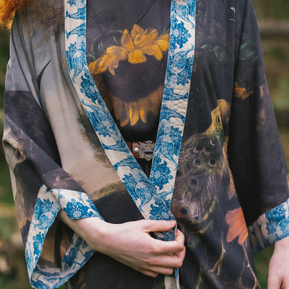
                  
                    Model wearing Wild Beauty Opera Duster with antique lush florals and peacock – Market of Stars
                  
                