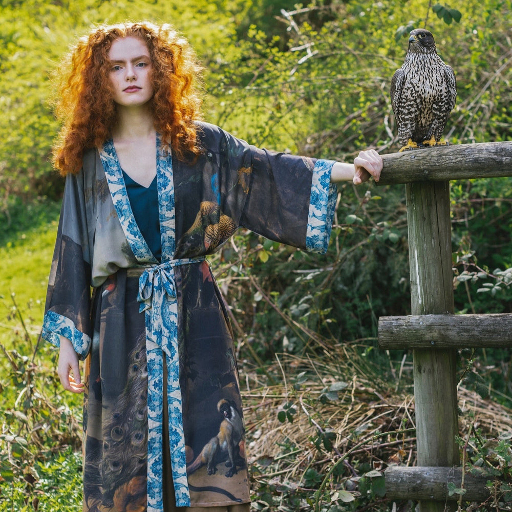 
                  
                    Model wearing Wild Beauty Opera Duster with antique lush florals and peacock – Market of Stars
                  
                