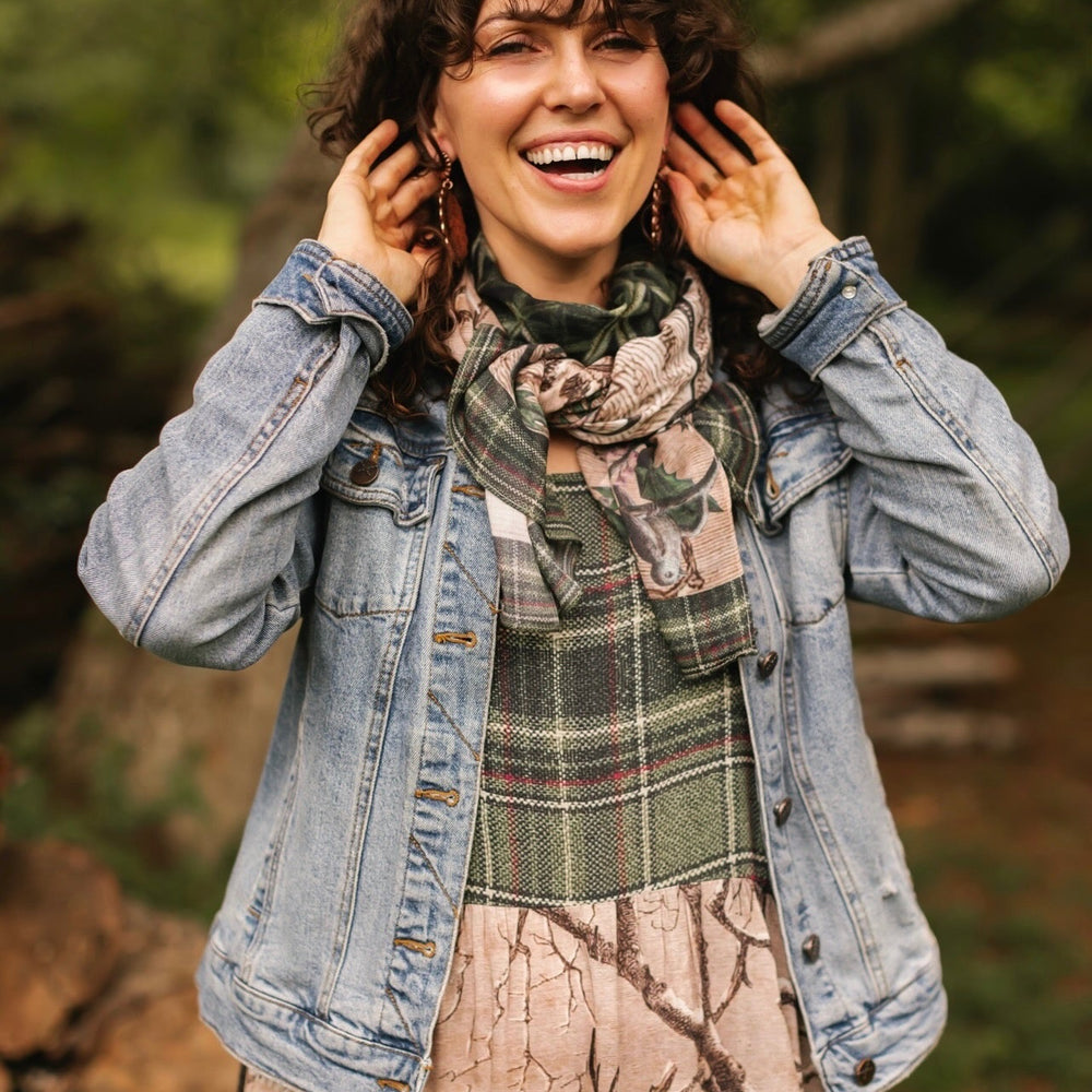 
                  
                    Model wearing a bamboo viscose scarf with a nostalgic print, snowflake wonder and the magic of the holiday season - Market of Stars
                  
                