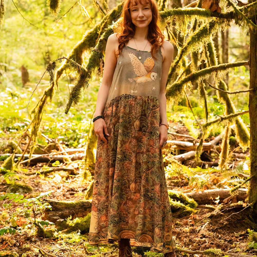 
                  
                    Model wearing a bamboo-viscose maxi length slip dress where even the unlikeliest of friends...a fox and a pheasant...find warmth in each other’s company. Created in collaboration with Charles van Sandwyck - Market of Stars
                  
                